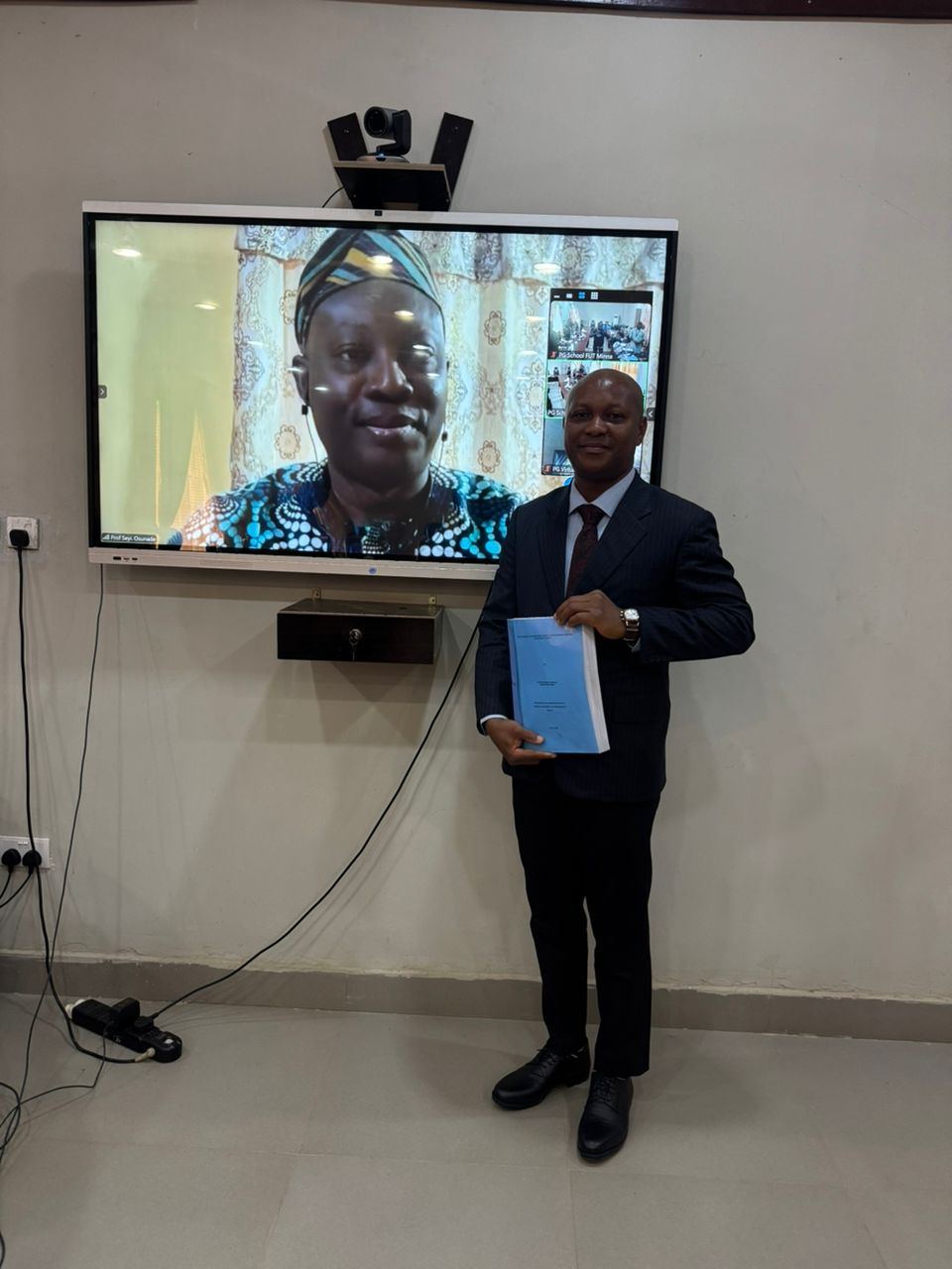 Award recognition displayed on screen
