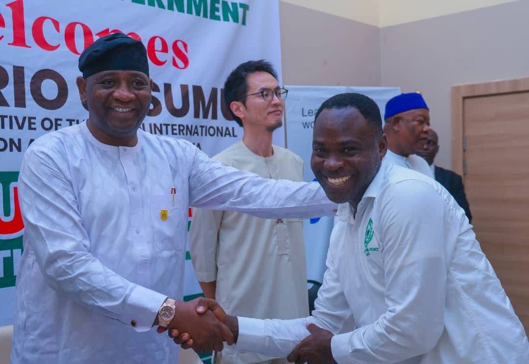 Partnership handshake at a Techbuildaz event