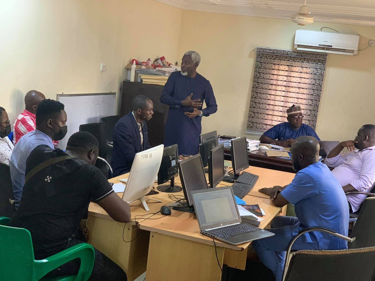 Trainees working on laptops