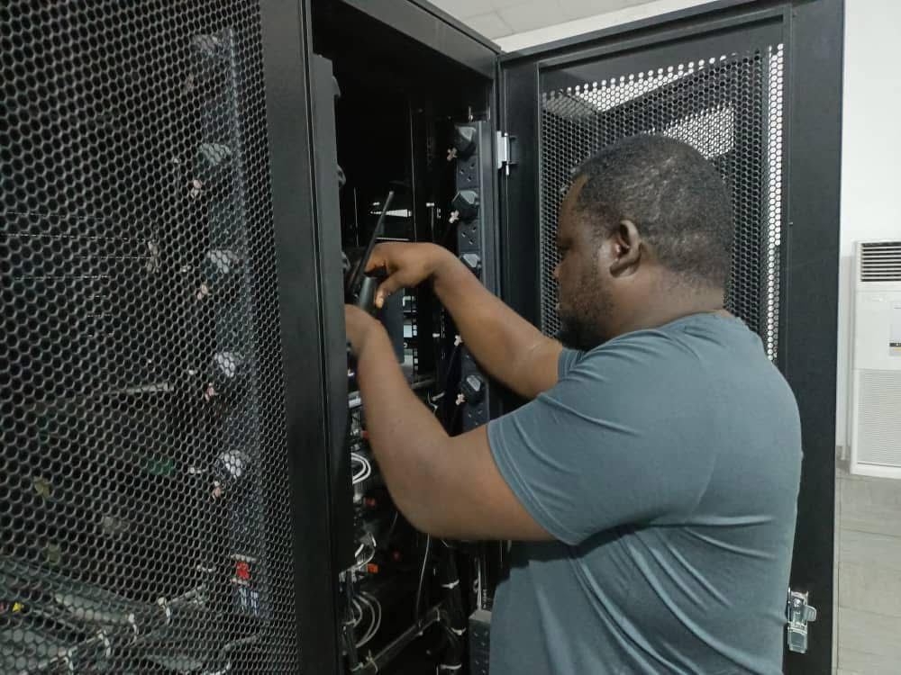 Technician working on server infrastructure